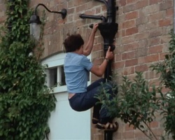 screenshot: George goes down the rainwater gutter