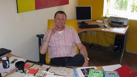 Karl Kolar in the office of moviemax GmbH movies & more